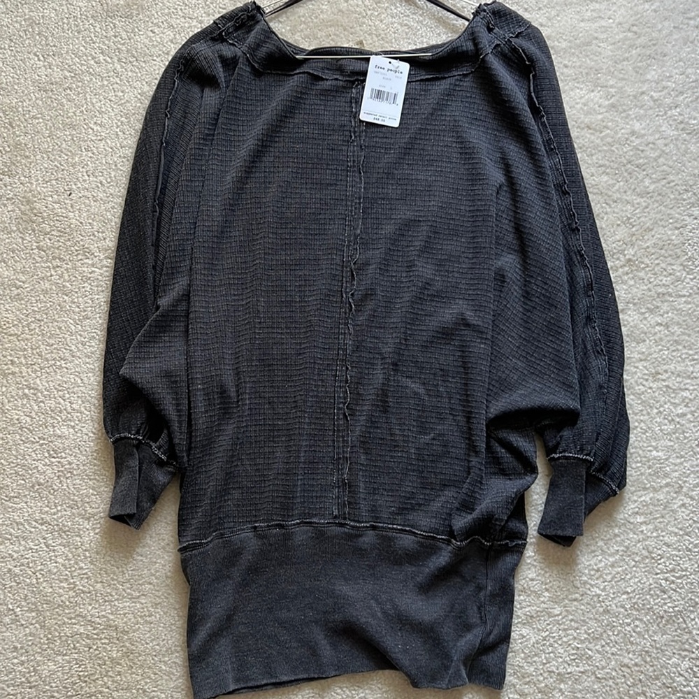 Brand new Free People 3/4 sleeve shirt. Tunic style shirt. With tag.